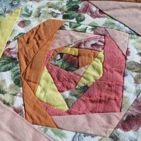 Ompele ruusutekniikalla tilkkutyö